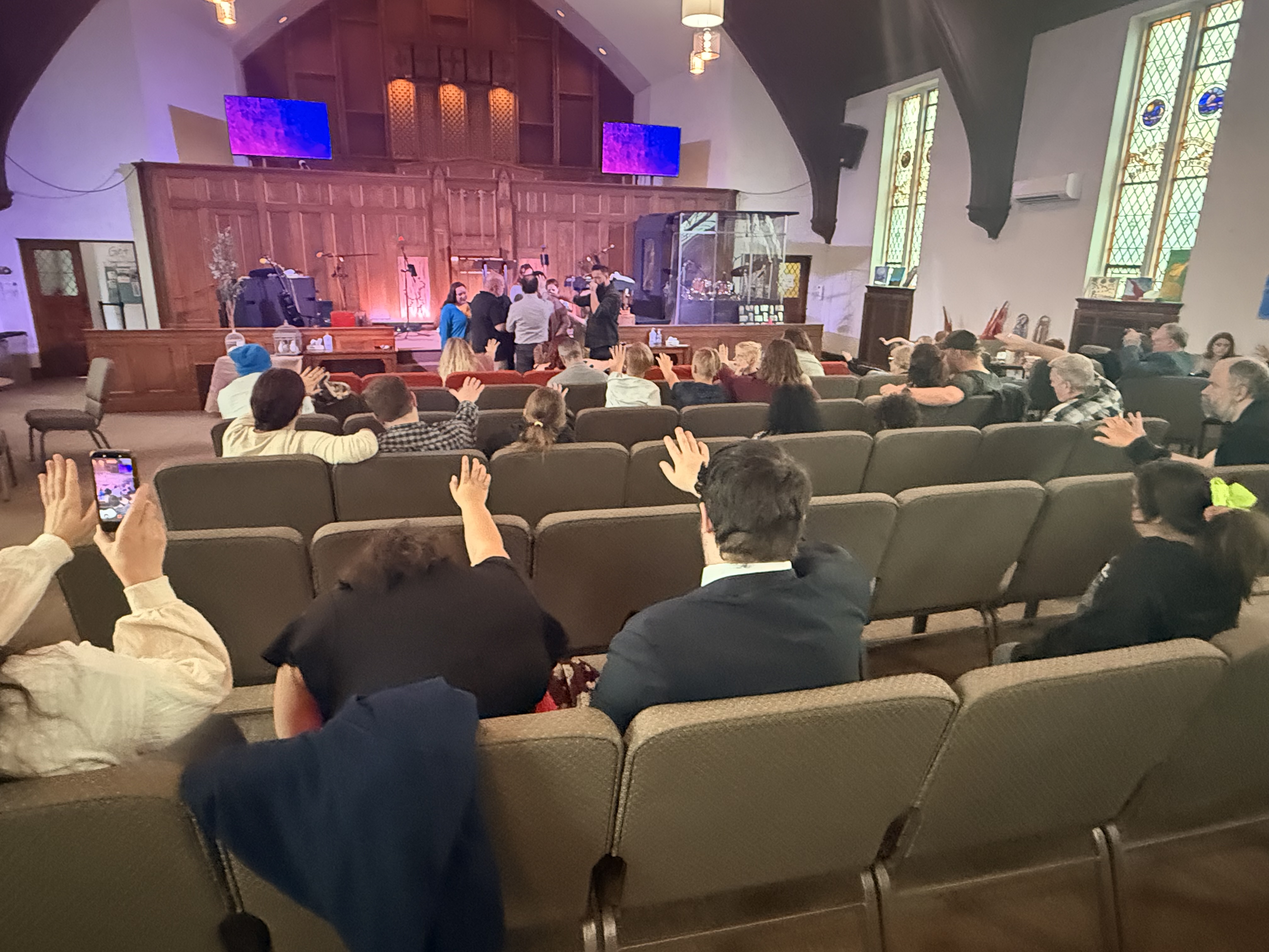 Wide view of the sanctuary during worship at Tree of Life Open Bible Church